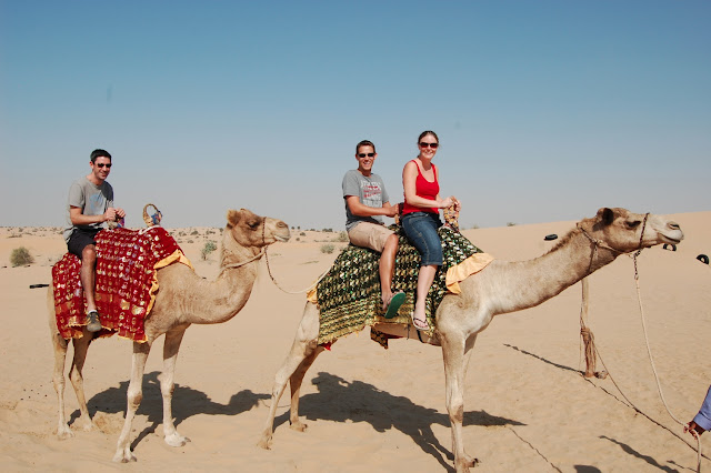 Camel riding in the desert