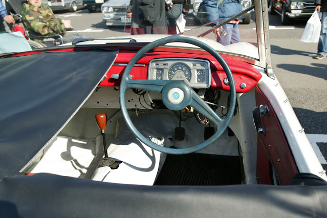 The Datsun Sports S211 with side curtains.