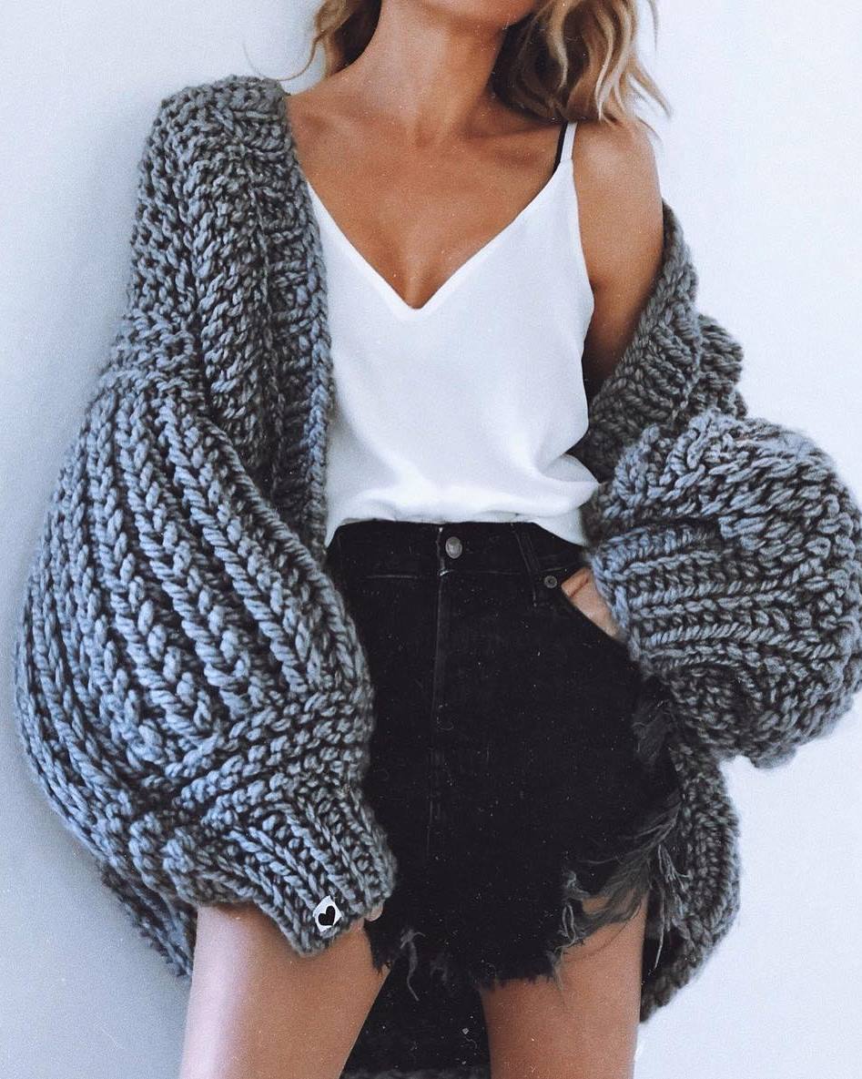 cozy fall outfit idea / white v-neck top + black denim shorts + knit oversized cardi