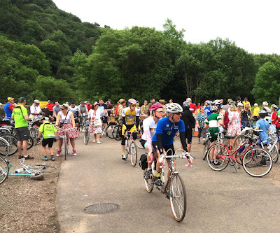 Riders setting off from a brief stop at Mill Dale Station