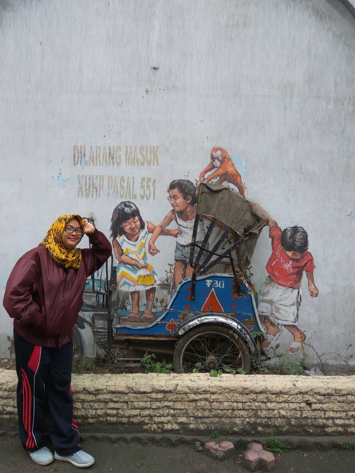 Berburu mural art karya ernest zacharevic di Medan 