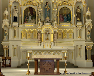 Main white alter with gold leaf.