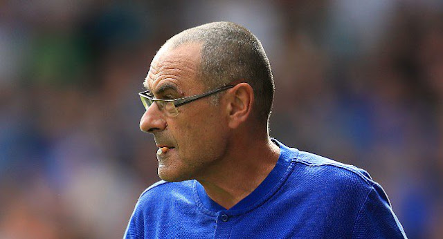 Chelsea coach Maurizio Sarri chewing a cigarette during game against Huddersfield