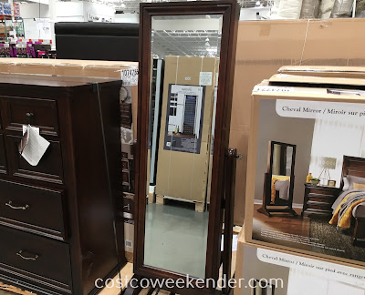 Store your jewelry and get dressed in front of the Universal Broadmoore Cheval Mirror