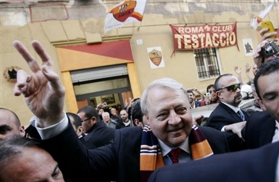 Boston businessman Thomas DiBenedetto greets fans as he leaves the AS Roma fan club in Rome