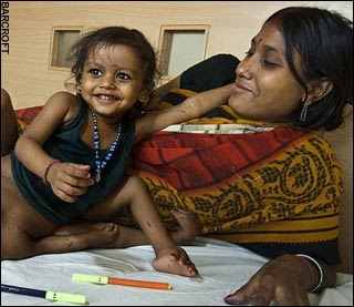 Lakshmi Tatma playing with her mum