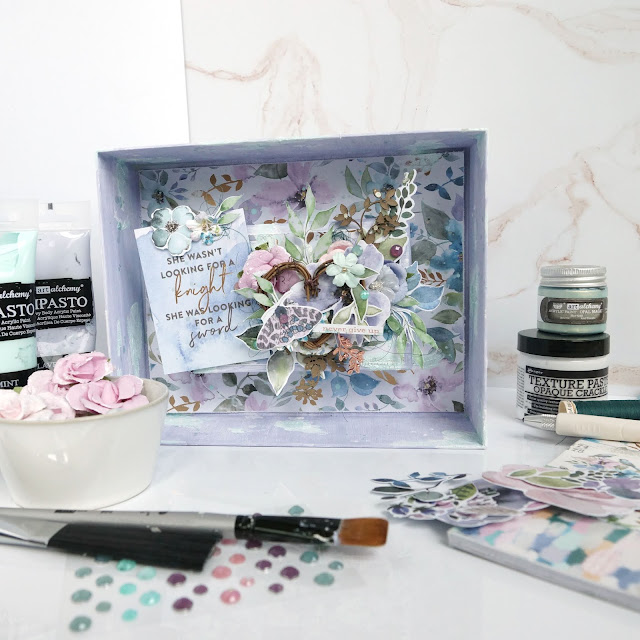 Never Give Up altered box mixed media art: Prima Marketing watercolor floral paper, butterfly and flower ephemera, fussy cut leaves, journaling card, paper flowers metal charm, say it in crystals; Finnabair art alchemy impasto paint, opal magic acrylic; Ranger crackle paste