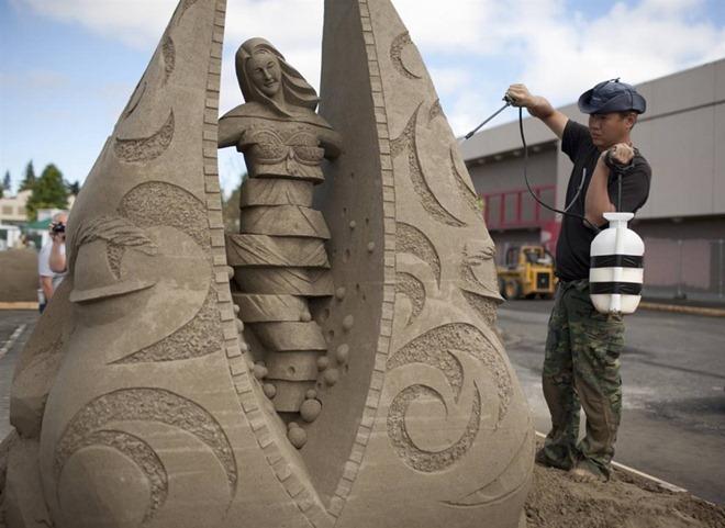 Sand Sculpture Art Work - Sculptures working on his creation...