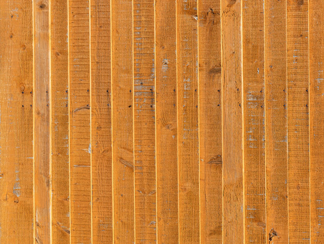 Wood panels orange hue texture