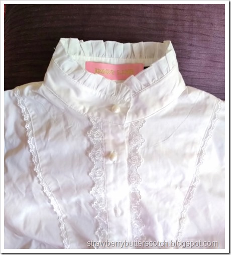 The high collar of the blouse after removing the ruffles.  It looks great like this and could easily be worn for vintage and antique clothing styles like steam punk as well as lolita fashion.