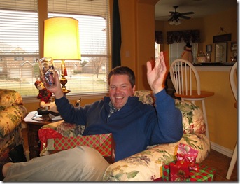 11.  Logan opening gift