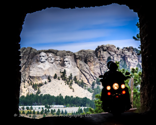 Sturgis Motorcycle Rally 2013 Image of Motorcycle Riding Through Tunnel with Mt Rushmore Behind by Dakota Visions Photography LLC