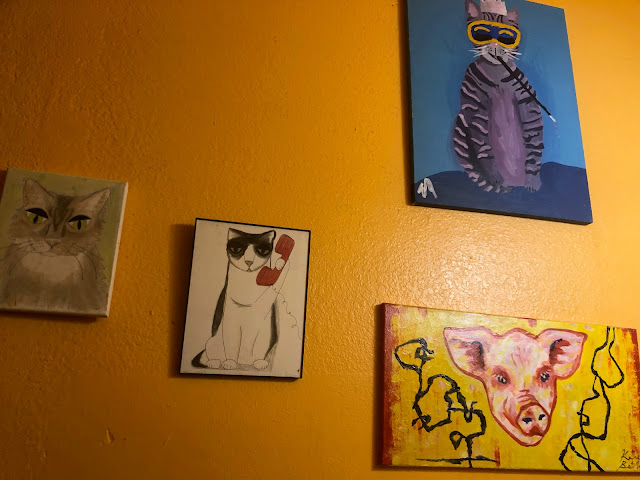 paintings of animals like pigs and cats inside the Counter Culture restaurant in Austin, Texas Vegan Vegetarian