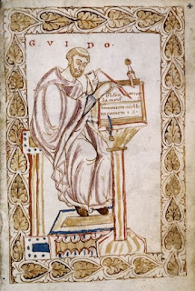 Il monaco, inventore della scrittura musicale