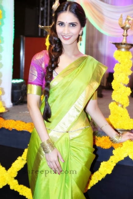Vaani kapoor in golden silk saree at "Aaha kalyanam" audio launch