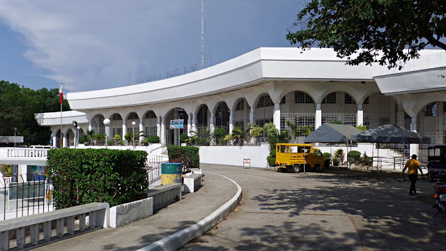 ramp driveway and perspective view of new Guimbal Municipal Hall