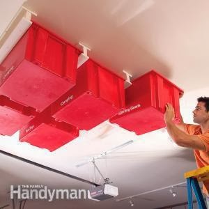 http://www.familyhandyman.com/garage/storage/create-a-sliding-storage-system-on-the-garage-ceiling/step-by-step