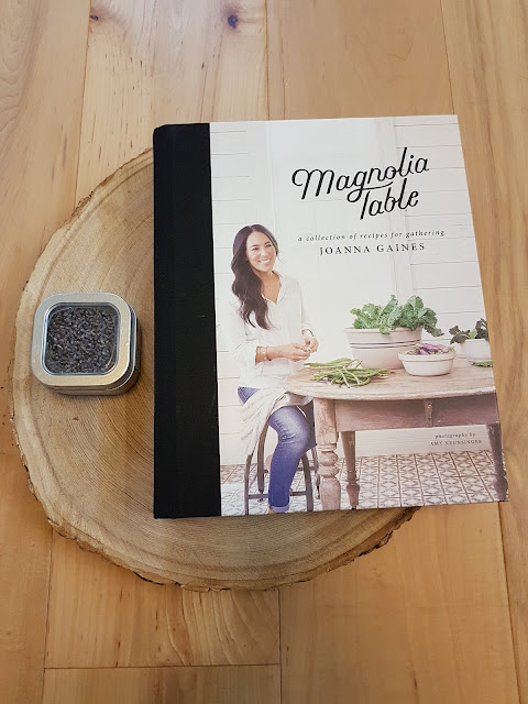 Magnolia table Cookbook on black ash plank