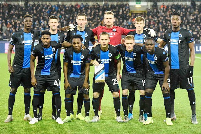 CLUB BRUGGE K. V. Temporada 2019-20. Odilon Kossounou, Brandon Mechele,  Hans Vanaken, Mignolet, Eduard Sobol, Simon Deli. Emmanuel Bonaventure Dennis, Percy Tau, Vorner, Thibault Vlieticnck y Balanta. CLUB BRUJAS 1 REAL MADRID C. F. 3. 11/12/2019. Liga de Campeones de la UEFA, fase de grupos, grupo A, 6ª jornada. Brujas, Bélgica, Jan Breydel Stadion (27.308 espectadores). GOLES: 0-1: 53’, Rodrygo. 1-1: 55’, Vanaken. 1-2: 64’, Vinicius. 1-3: 90+1’, Modric.