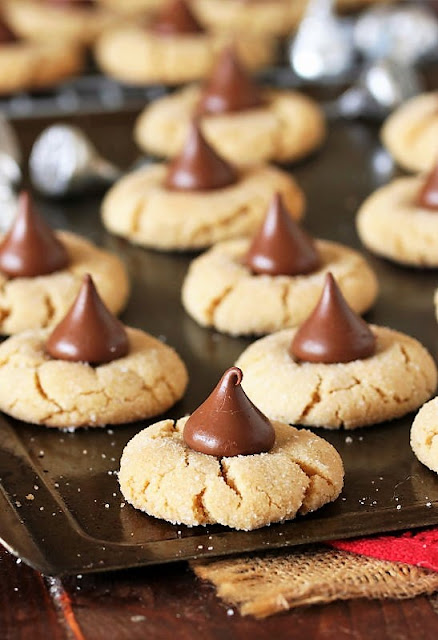 Peanut Butter Blossoms Cookies on Baking Sheet Image