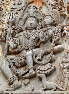 Shiva-Parvati, the cosmic couple ancient stone carving 