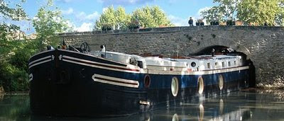 French Hotel Barge ALEGRIA. Cruise the Canal du Midi in the south of France. Contact ParadiseConnections.com