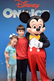 Boy and girl with Mickey Mouse - Disney on Ice