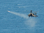 A British Army Apache helicopter fires a Hellfire missile for the first time at sea in exercise ranges off Gibraltar Apache Hellfire