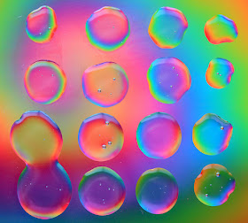 Water drops refracting into the psychedelic spectrum