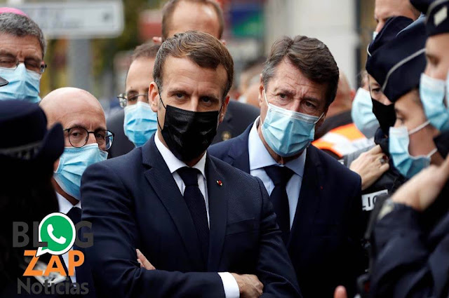 Presidente Emmanuel Macron e seguranças