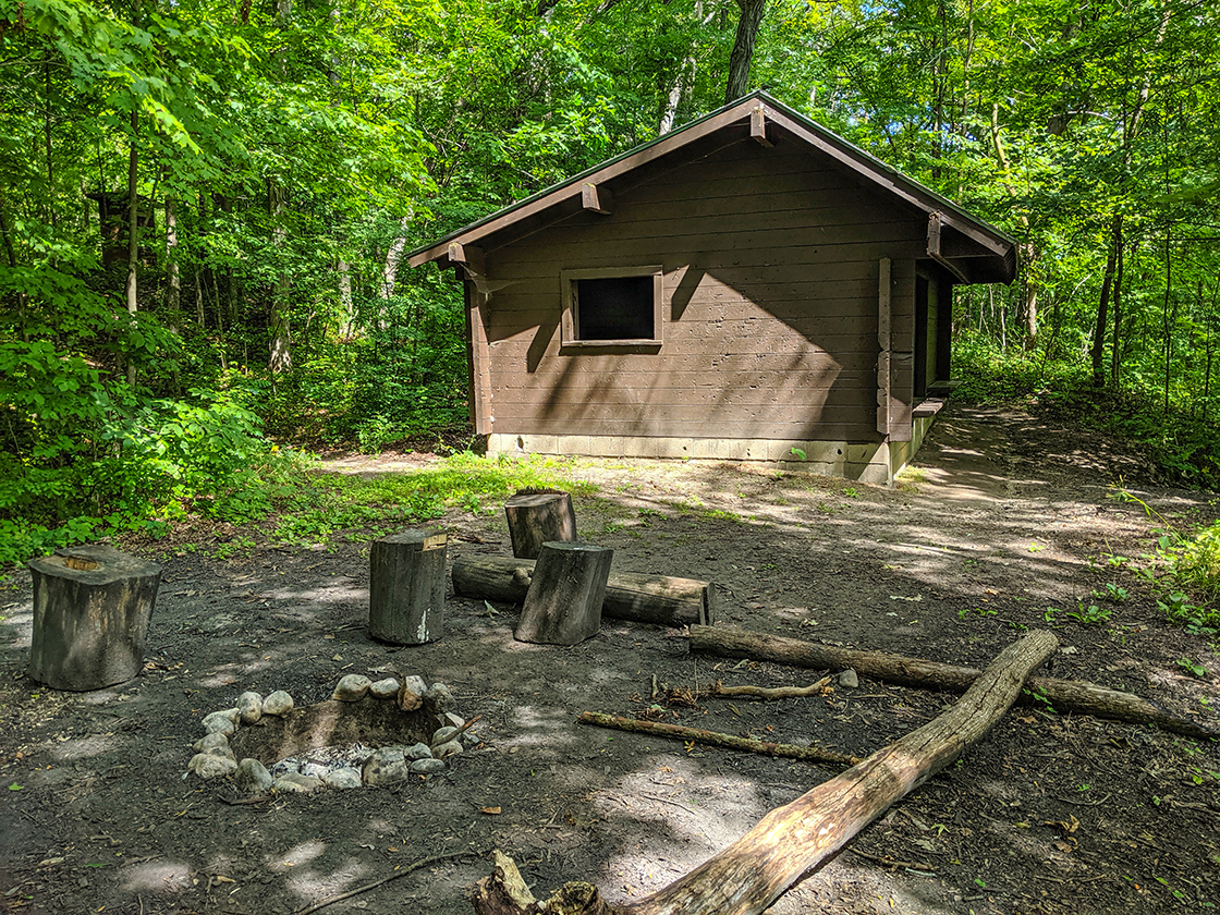 Adirondack shelter and fire pit