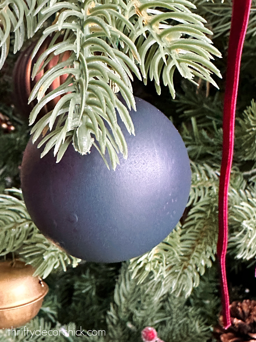 painted blue Christmas bulb