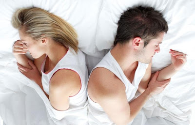 Are You Trapped In A Sexless Marriage - man and woman sleeping in bed - bad marriage sex life - sad couple