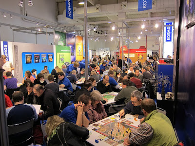 Essen Spiel 2010 - Day 2 People playing games everywhere