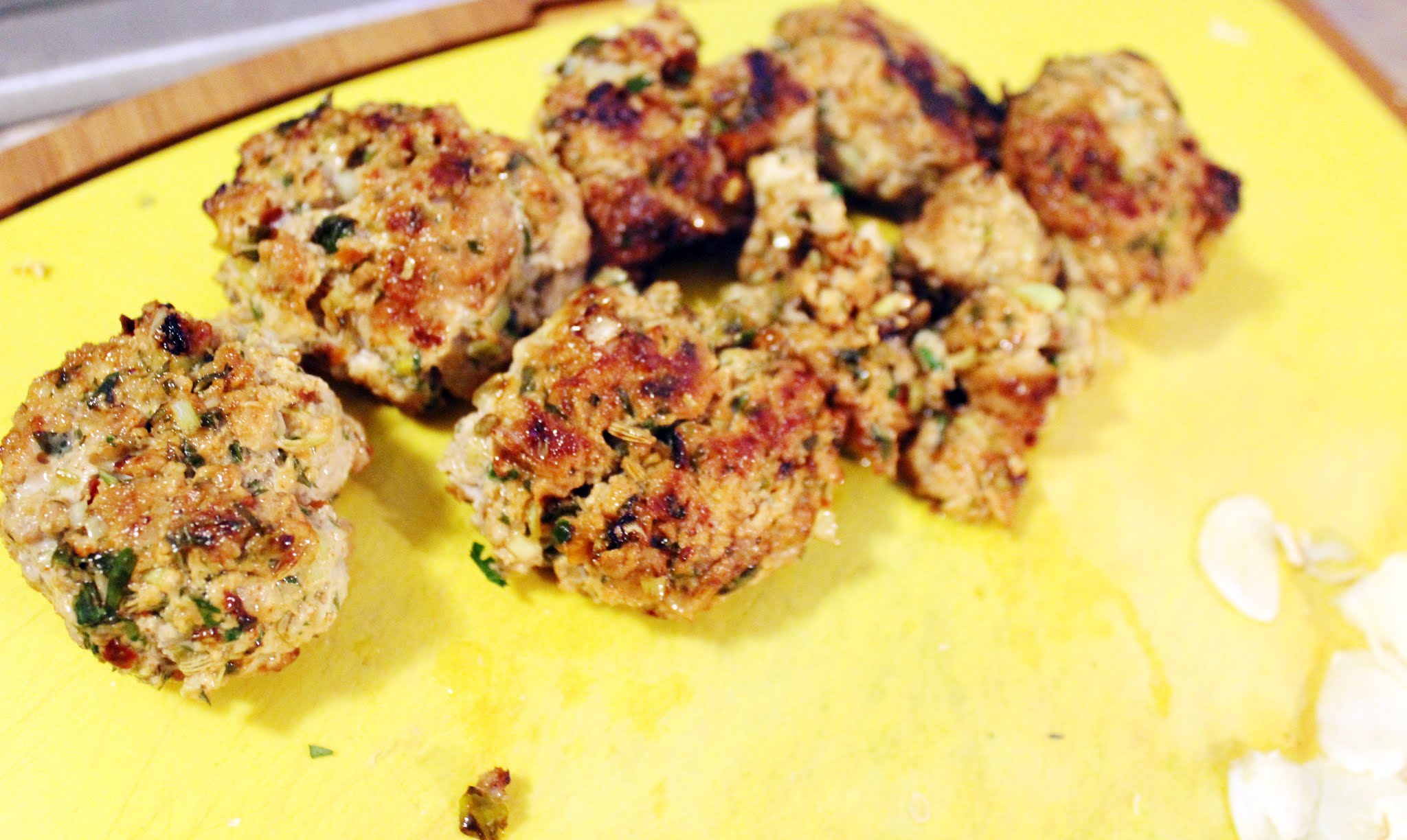 Spicy Pork Meatballs in Brothy Tomatoes and Toasted Fennel