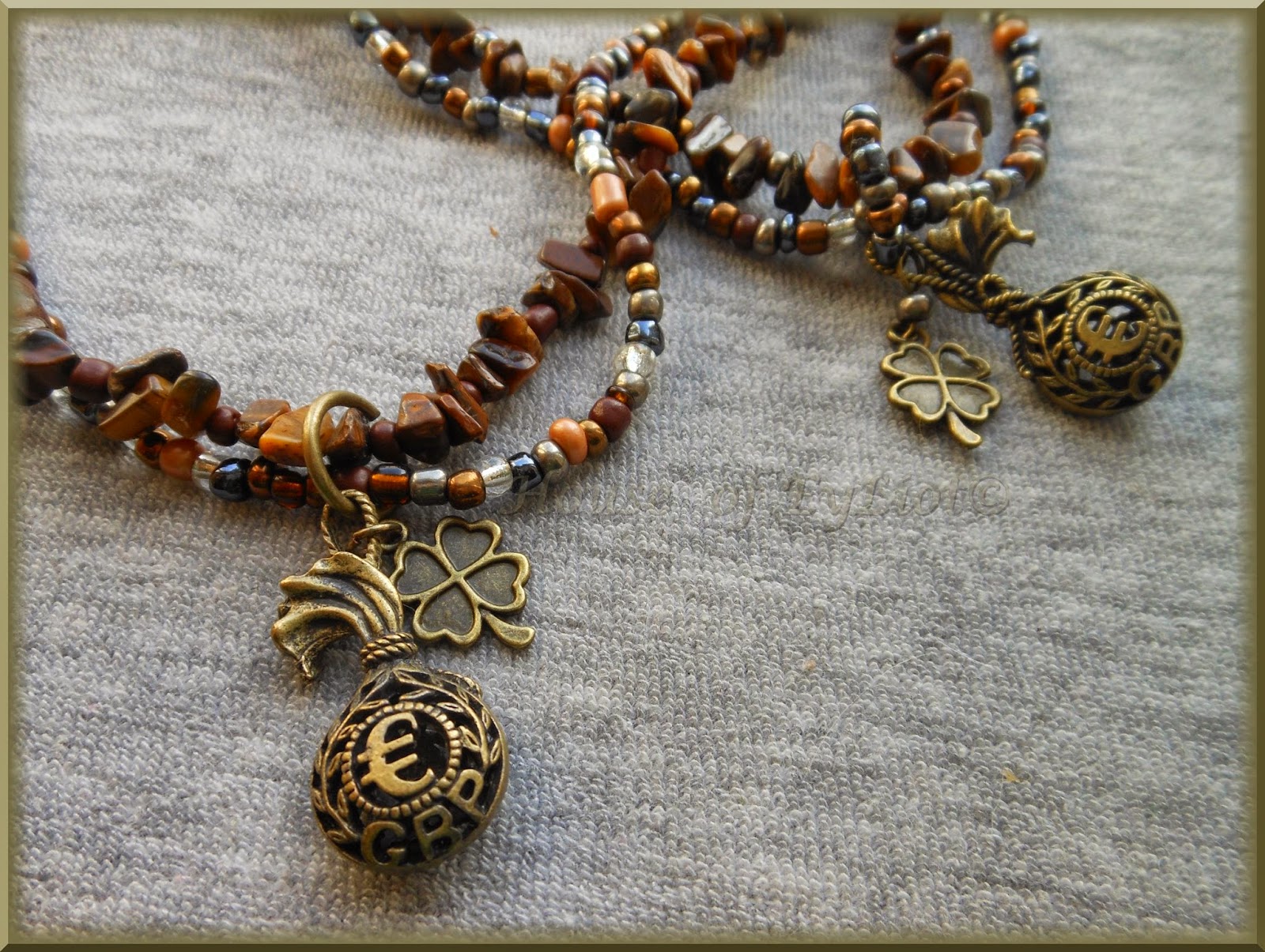 http://eyliot.wix.com/esoteric-jewelry#!talisman-din-ochi-de-tigru-pentru-noroc-/c1aqw