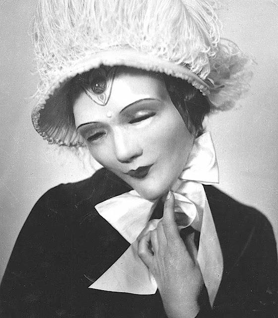 a 1926 William Mortensen photograph of a masked woman