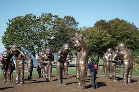 A-Maze-Ing Laughter, by Yue Minjun at Morton Triangle