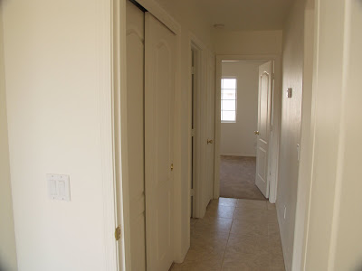 Hallway Access to Bedrooms, Linen Closet, and Guest Bathroom