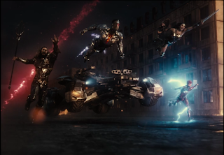 A shot of the Justice League charging into battle, where they freeze for a moment.