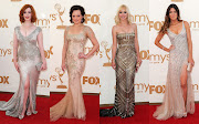 Mad Men's Christina Hendricks wore a curvehugging silver Johanna Johnson . (emmy )