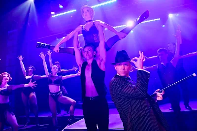 "Razzle Dazzle" musical number  Keith Pinto (foreground as "Billy Flynn") alongside  Matthew Kropschot, Monica Moe, Jacqueline Neeley,  Jill Miller, Zoey Lytle, Tracey Freeman-Shaw,  Tony Wooldridge, Nick Rodrigues  Photo by Dave Lepori