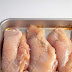 Place raw chicken in baking dish