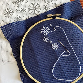 Snowflake cross stitch in progress