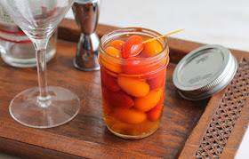 Food Lust People Love: Spicy pickled grape tomatoes are a tasty addition to salads or to serve alongside fish or chicken. The natural sweetness of the grape tomatoes are beautifully complemented by the rice vinegar, salty fish sauce and hot chili pepper. My favorite way to use them is in dirty martinis!