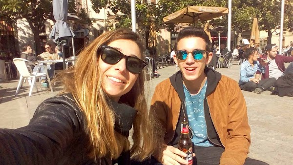 two people make selfie in Placa del Sol in Gracia