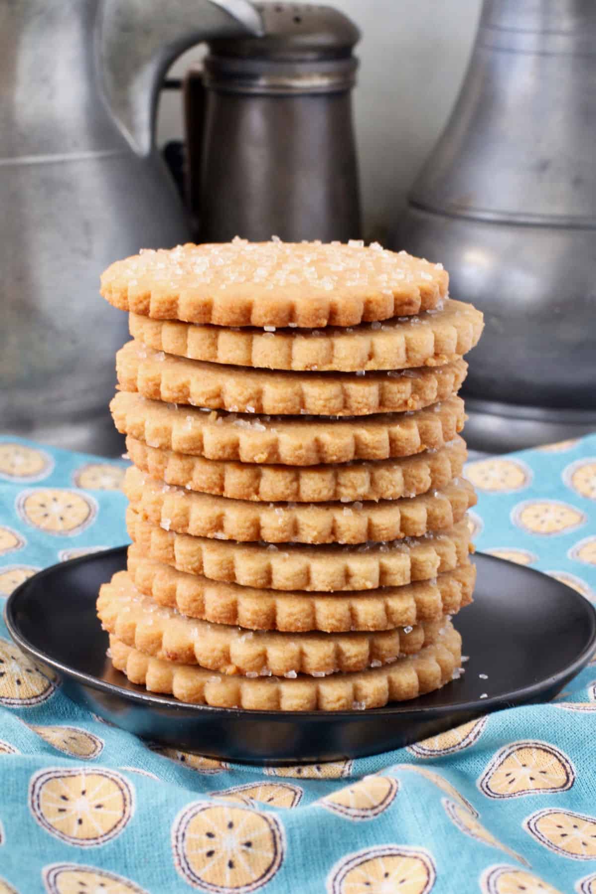 Homemade Graham Crackers Stacked on a plate.