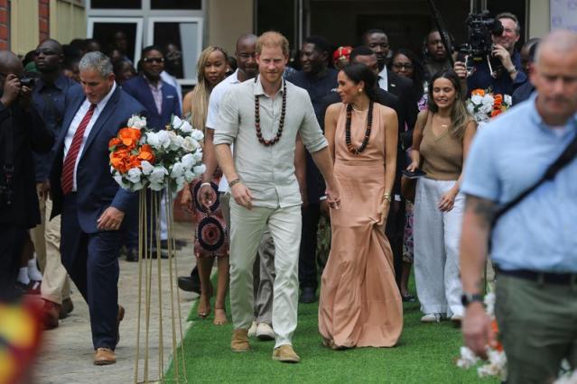 Prince Harry and Meghan, greeted with cheers, talk mental health in Nigeria