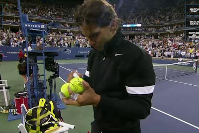 Rafael Nadal tennis balls autograph win round one Golubev photos pictures images screencaps screengrabs pics