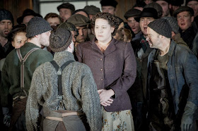 Elza van Heever and members of ENO in David Alden's production of Britten's Peter Grimes, ENO. Picture credit Robert Workman